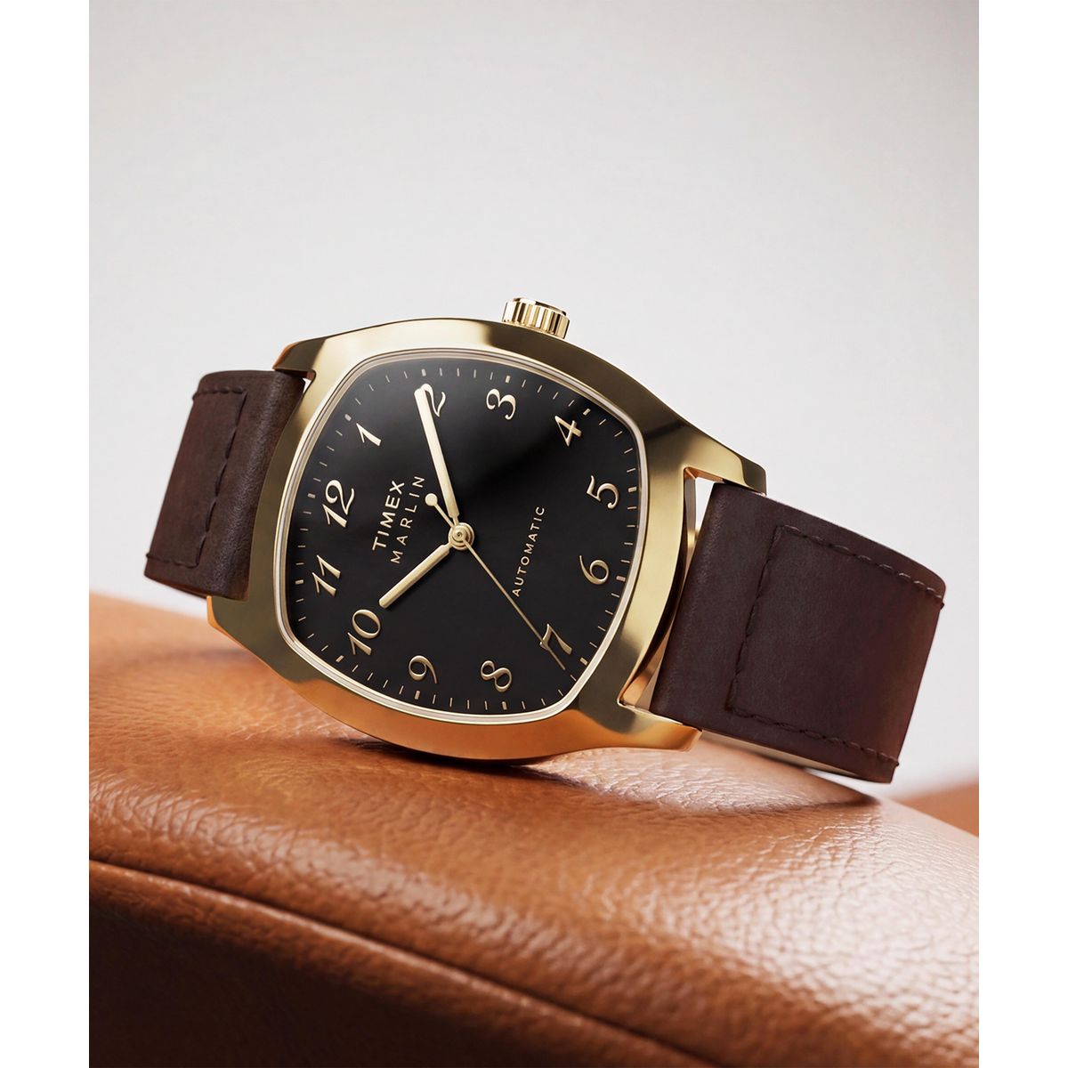 Close-up of the Timex Marlin Tonneau TW2Y84500 Breguet numerals on the black dial