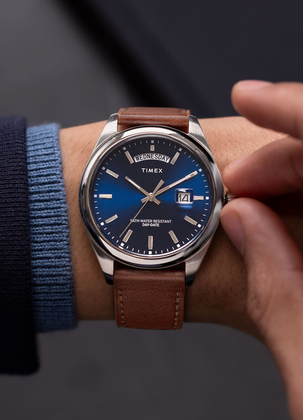 Timex Legacy Quartz Blue Dial Day-Date Leather Band Watch TW2W57200 shown on wrist with brown leather strap.