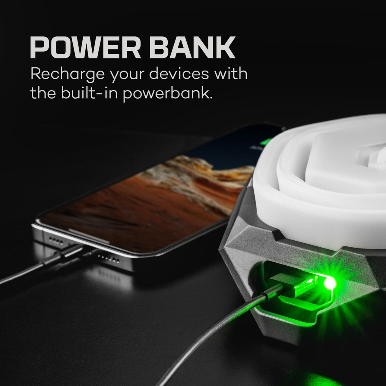 Power bank with a built-in charging cable and glowing green indicator light.