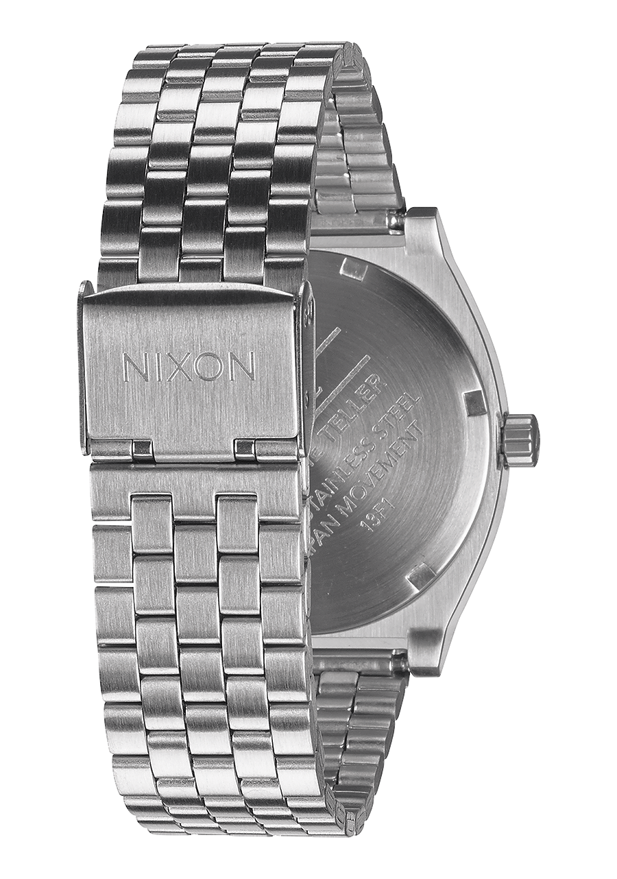 Stainless steel wristwatch with a metal link bracelet and Nixon branding.