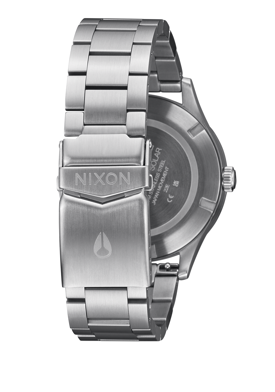 Stainless steel wristwatch with a metal bracelet and Nixon branding on the clasp.