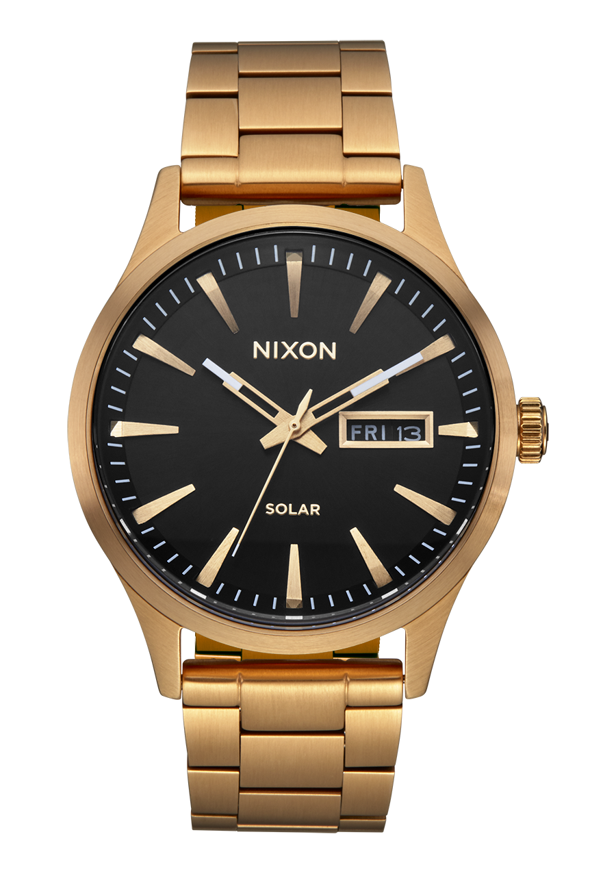 Nixon black gold cheap watch