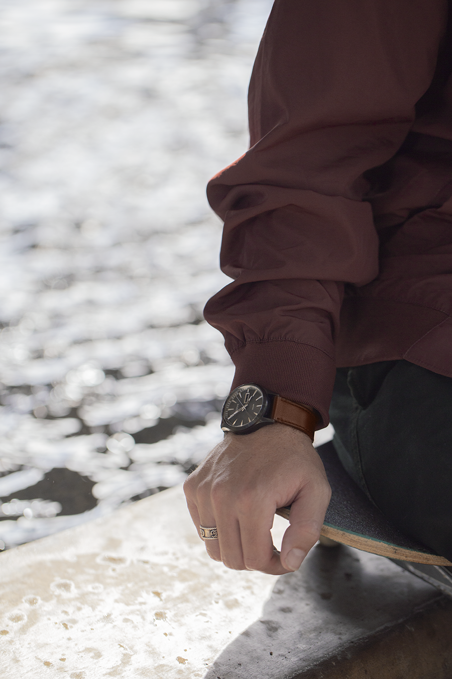 Wristwatch on a person’s hand.