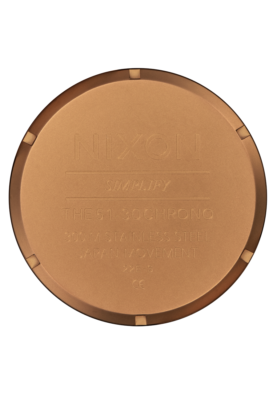 Circular bronze or copper-colored medal or coin with embossed text and design elements.