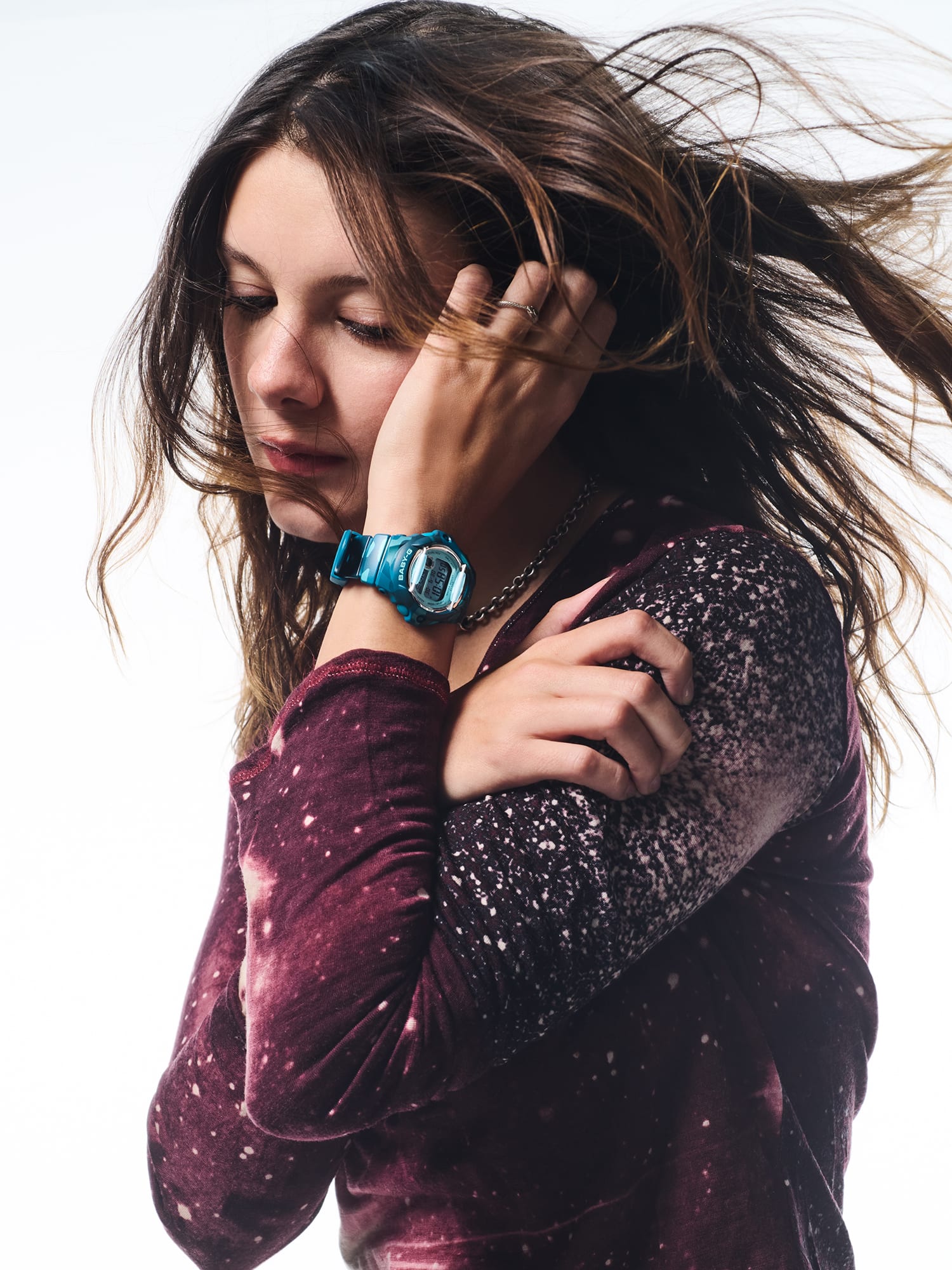 Baby-G BG169CM-2D blue camouflage watch worn on the wrist.
