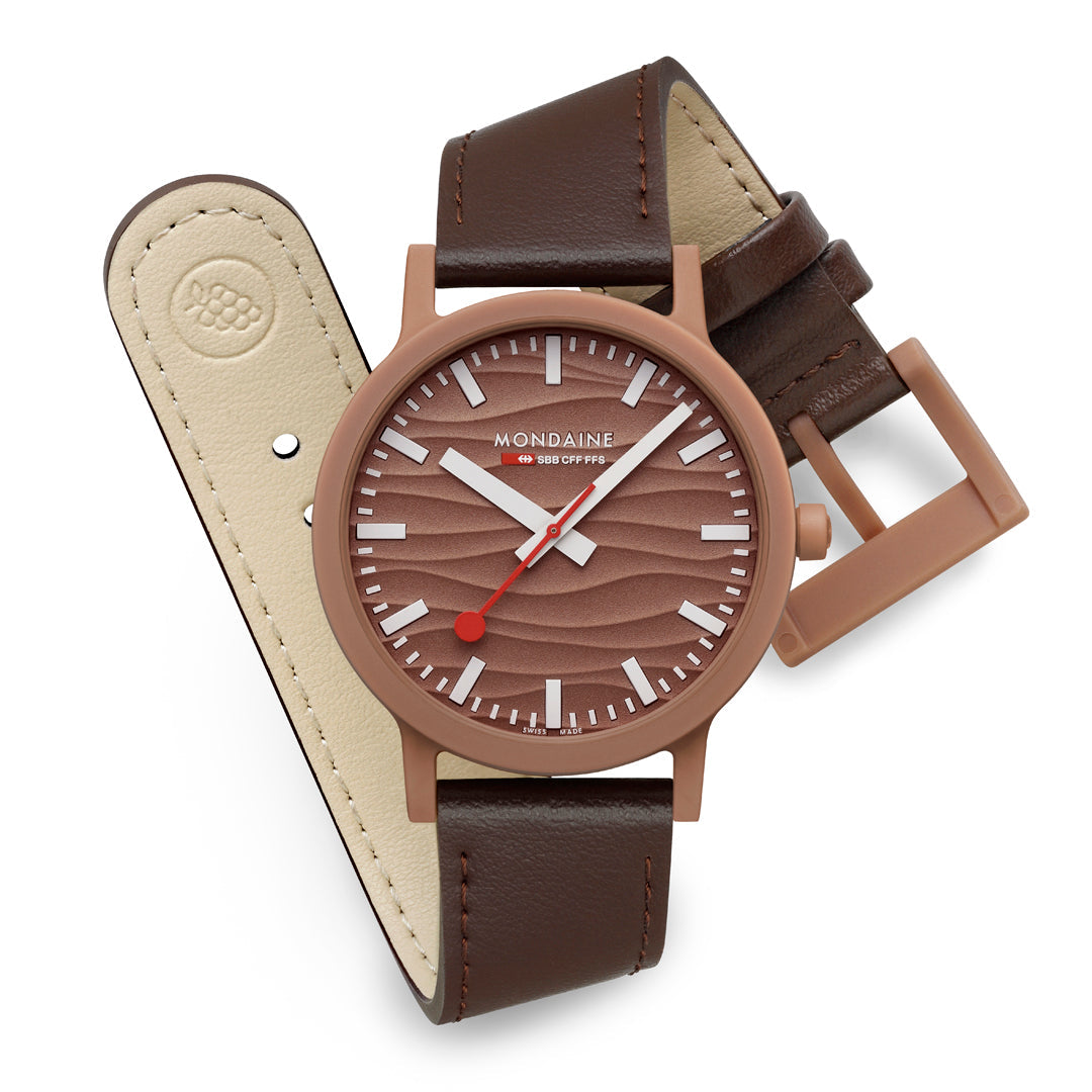 Mondaine Limited Edition Essence Mocha 41mm watch with wave-textured mocha dial and brown leather strap.