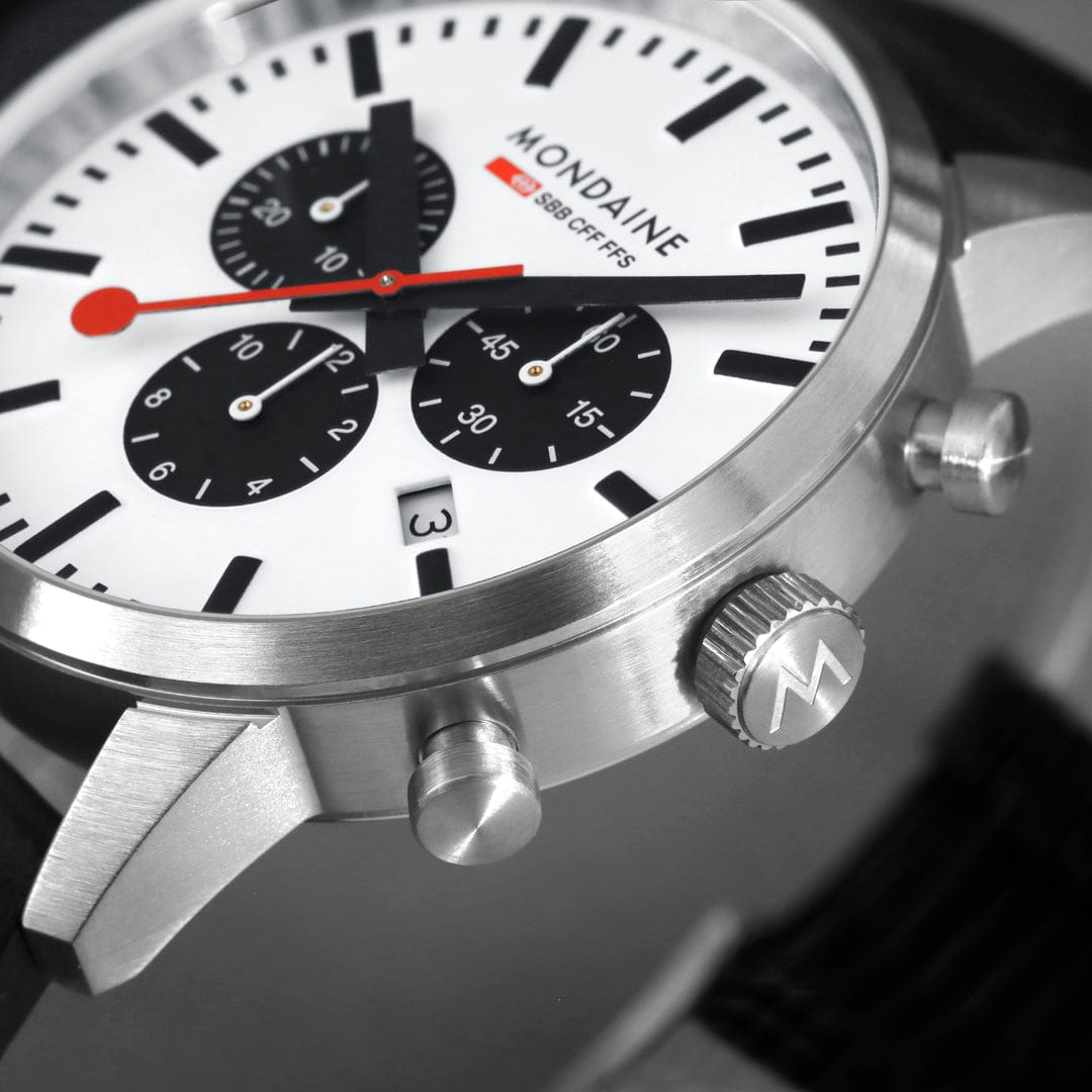 Sleek silver chronograph wristwatch with a white dial and red second hand.