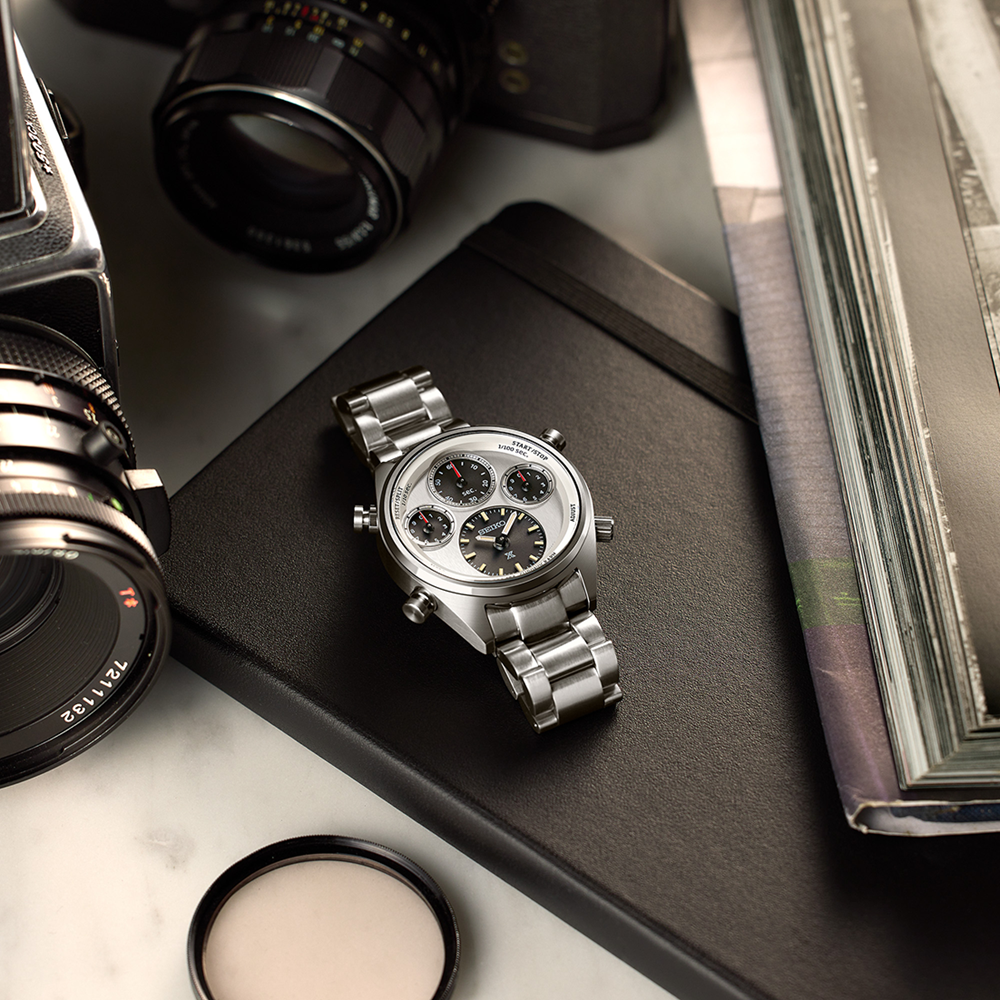 Stainless steel chronograph wristwatch with a triple subdial face.