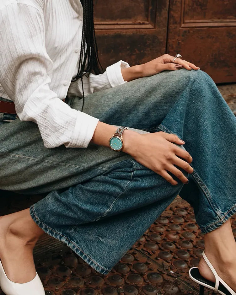 Bulova Sutton 97L203 women's watch with turquoise mother-of-pearl dial and tobacco brown leather strap — lifestyle view