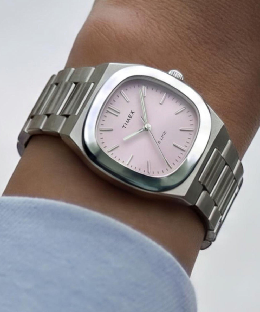 Timex E Line TW6A01000 pink dial silver-tone bracelet watch worn on the wrist