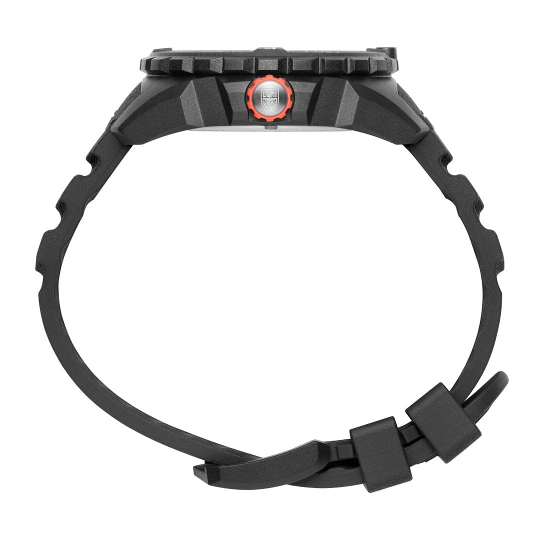 Black wristwatch with a rugged design and orange accents on the side.