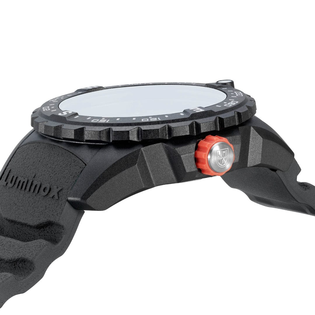 Rugged sports watch with a black case and red button on the side.
