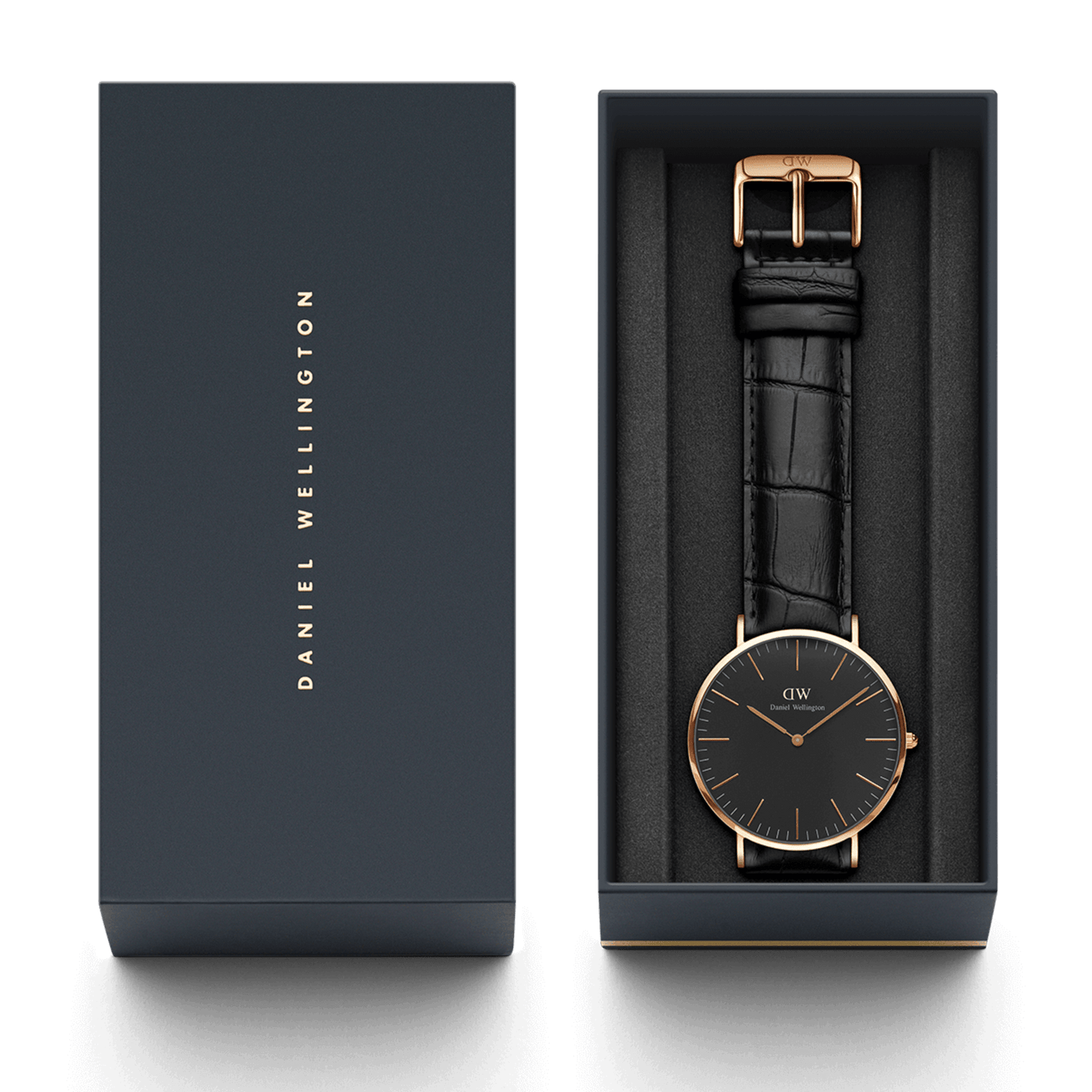 Elegant wristwatch with a black face and gold-tone case in a presentation box.