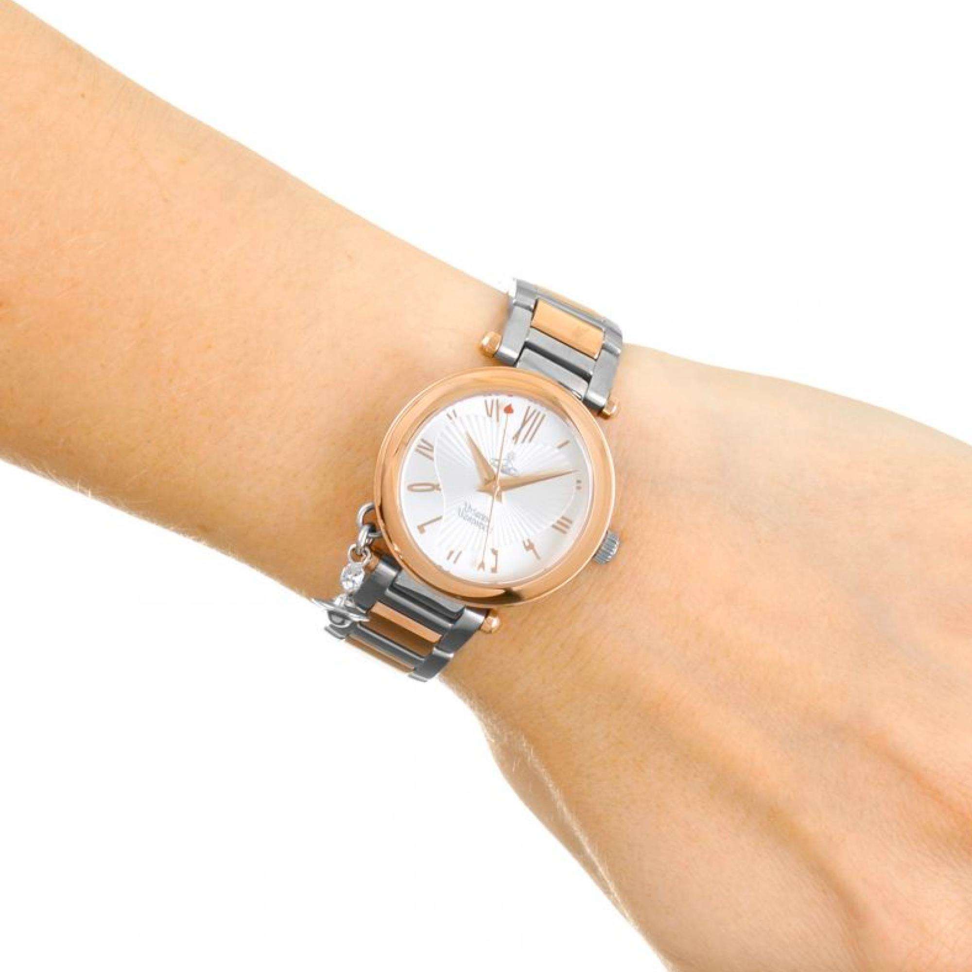 Vivienne Westwood Orb women's watch with a silver dial and two tone stainless steel bracelet. Shown at an angle.