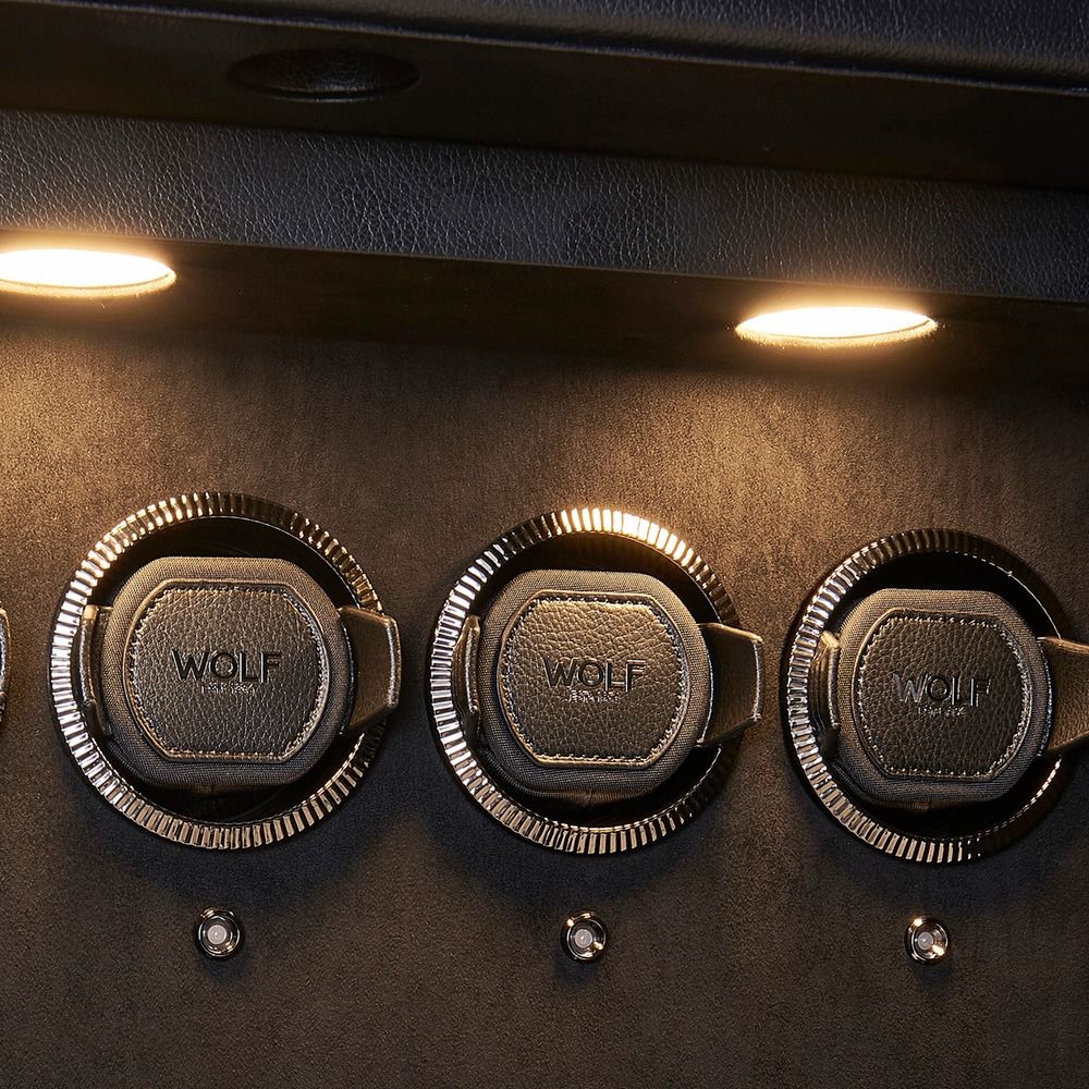 WOLF Athos 16 Piece Watch Winder Safe in Black, close-up of the lit watch winder modules