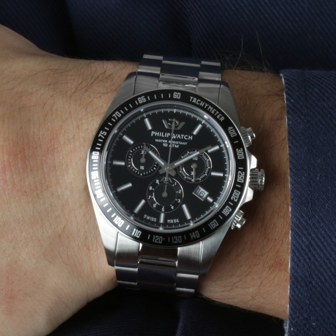 Stainless steel chronograph wristwatch with a black dial and metal bracelet.
