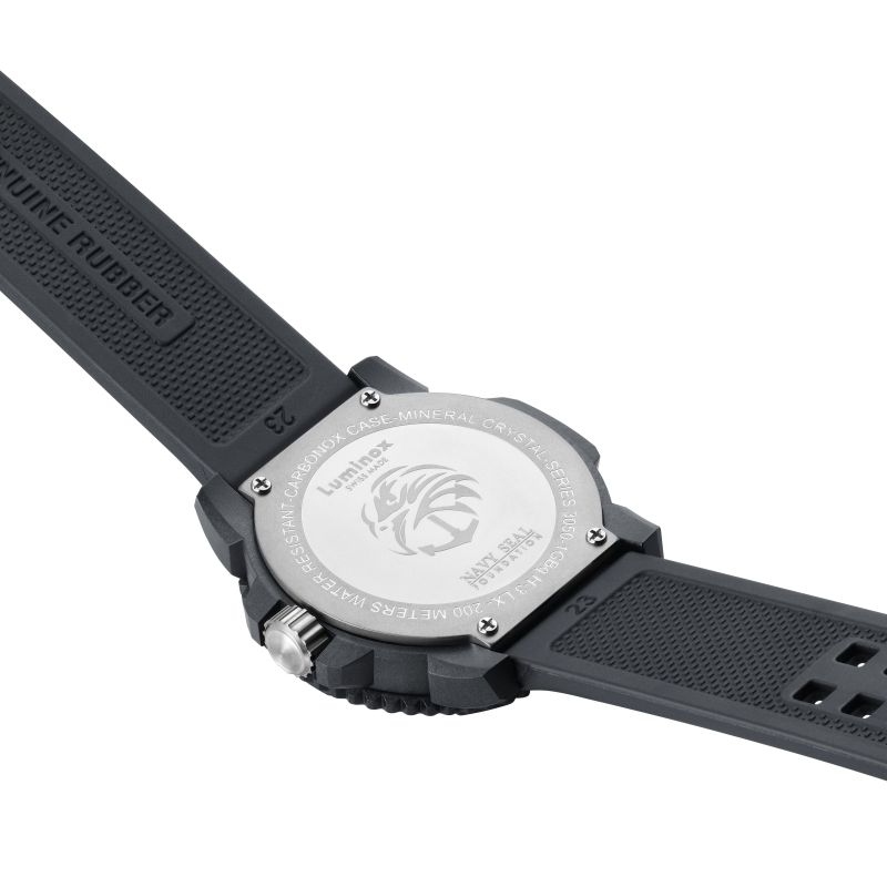 Back of a wristwatch with a black rubber strap and silver case.