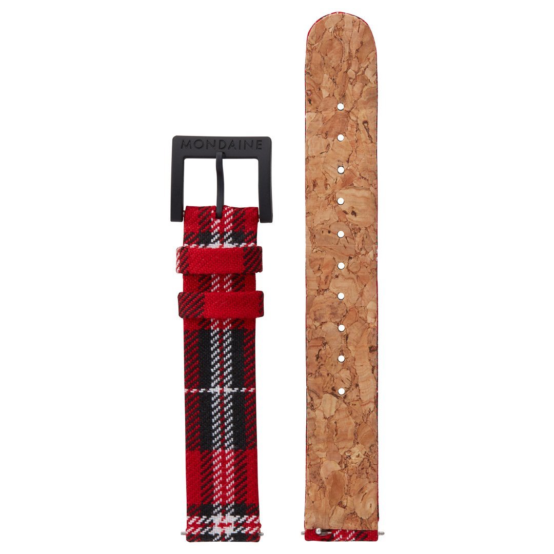 Plaid fabric watch strap with a black buckle and cork-textured backing.