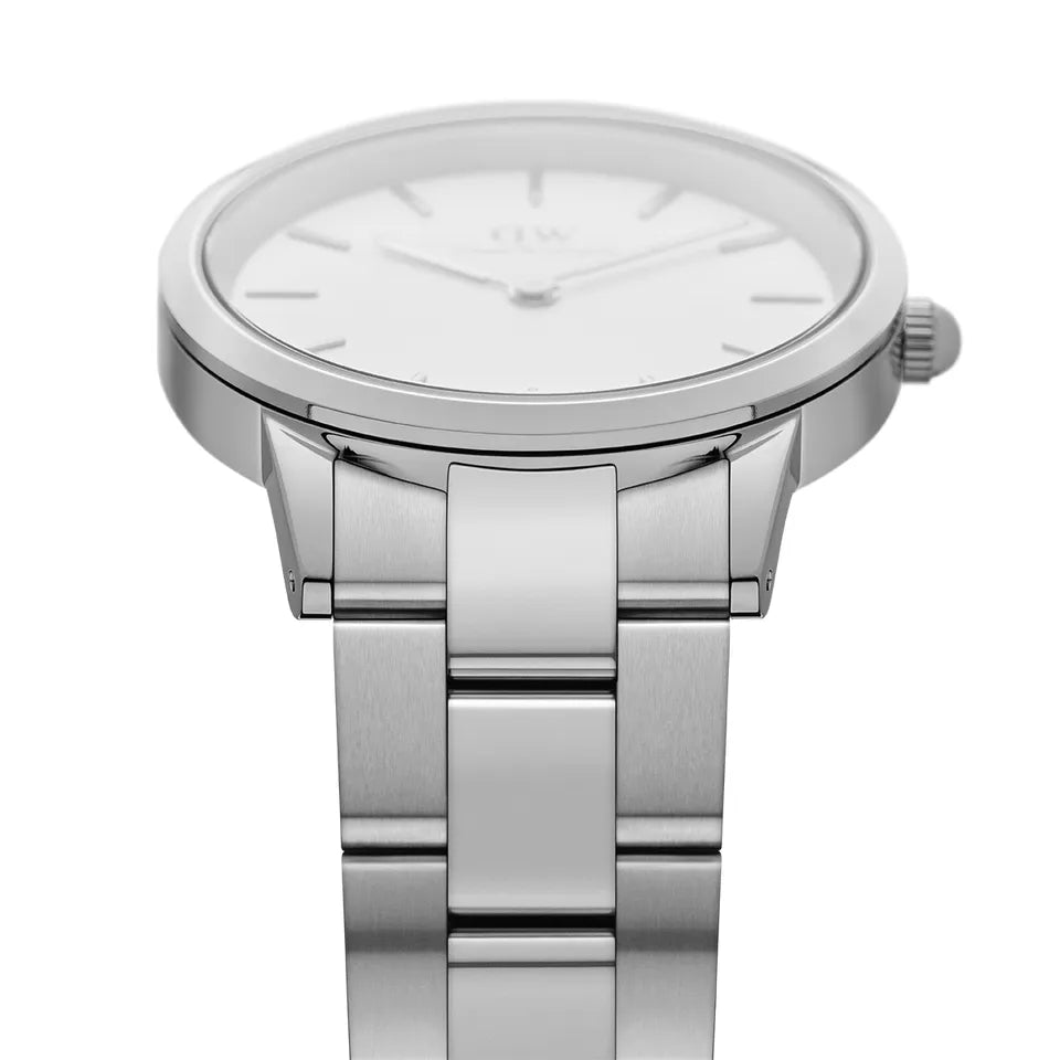 Sleek silver wristwatch with a minimalist white dial and metal bracelet.