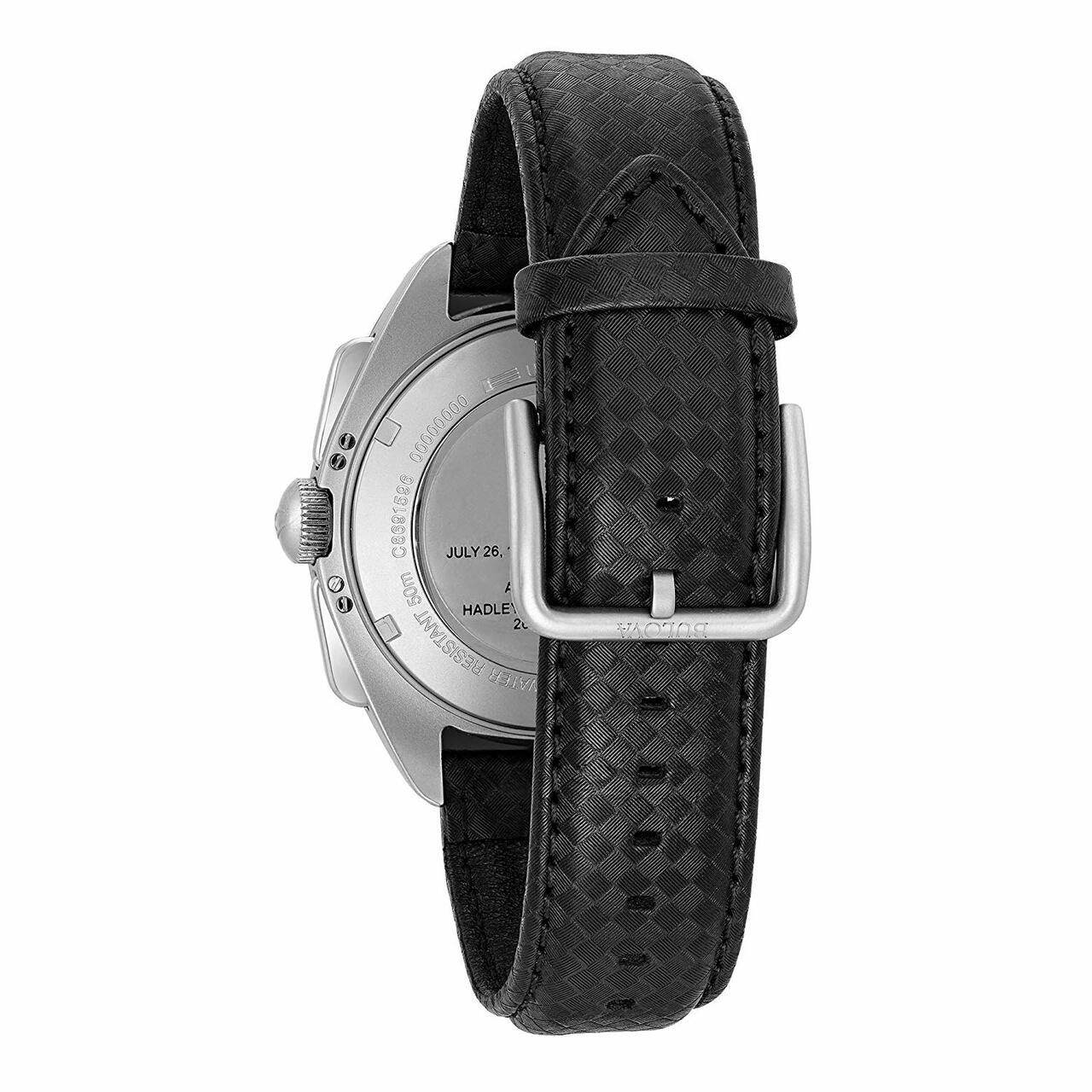 Wristwatch with a silver case and black leather strap.