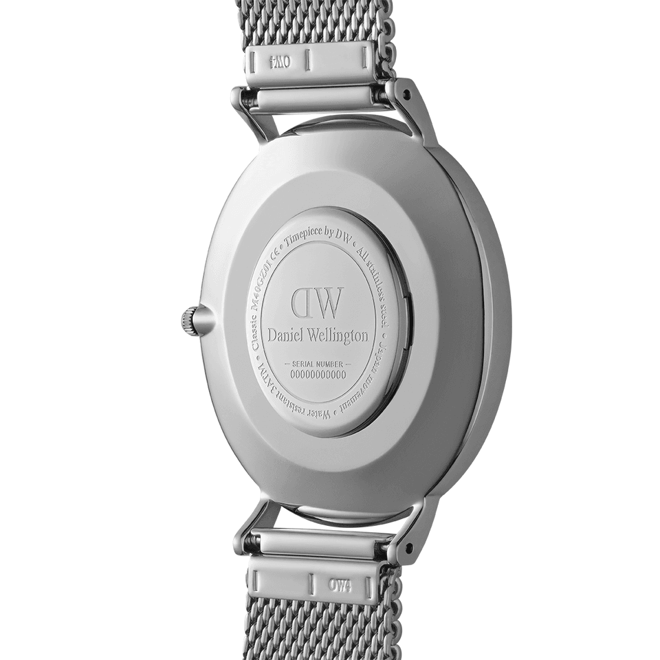 Back of a Daniel Wellington wristwatch with a metal mesh band.