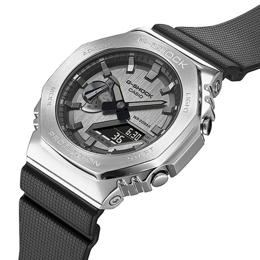 Silver G-Shock watch with a black strap and analog-digital display.