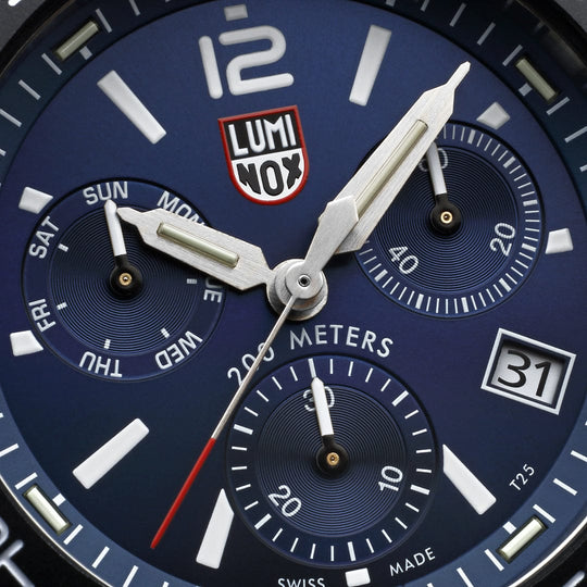 Luminox wristwatch face with a navy blue dial and multiple subdials.