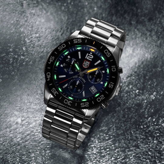 Stainless steel wristwatch with a black dial and colorful markings.