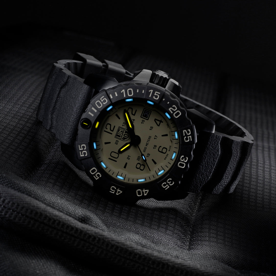 Rugged black wristwatch with luminous dial markings and a rotating bezel.