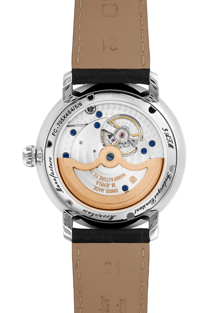 Mechanical watch movement visible through a transparent case back, attached to a leather strap.