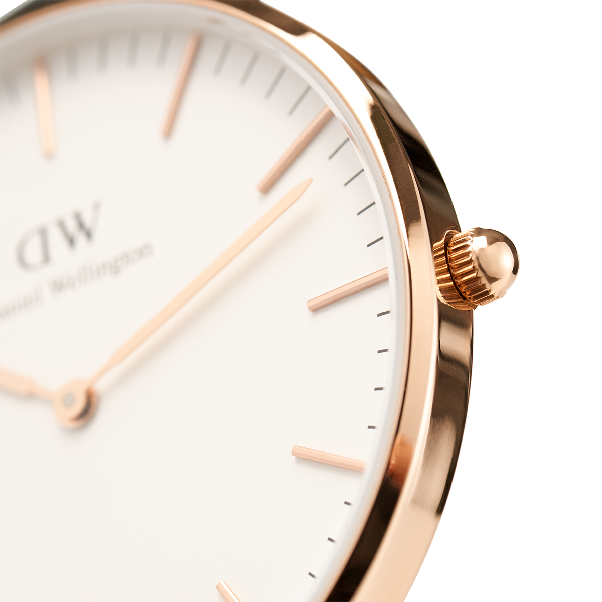 Elegant rose gold wristwatch with a minimalist white dial and slender hour markers.