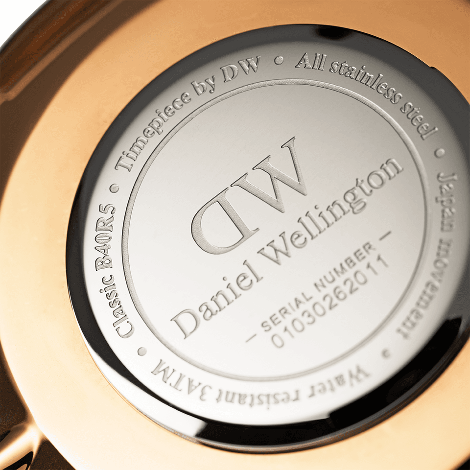 Engraved caseback of a Daniel Wellington watch.