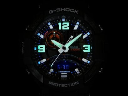 G-Shock watch face with illuminated analog and digital displays.