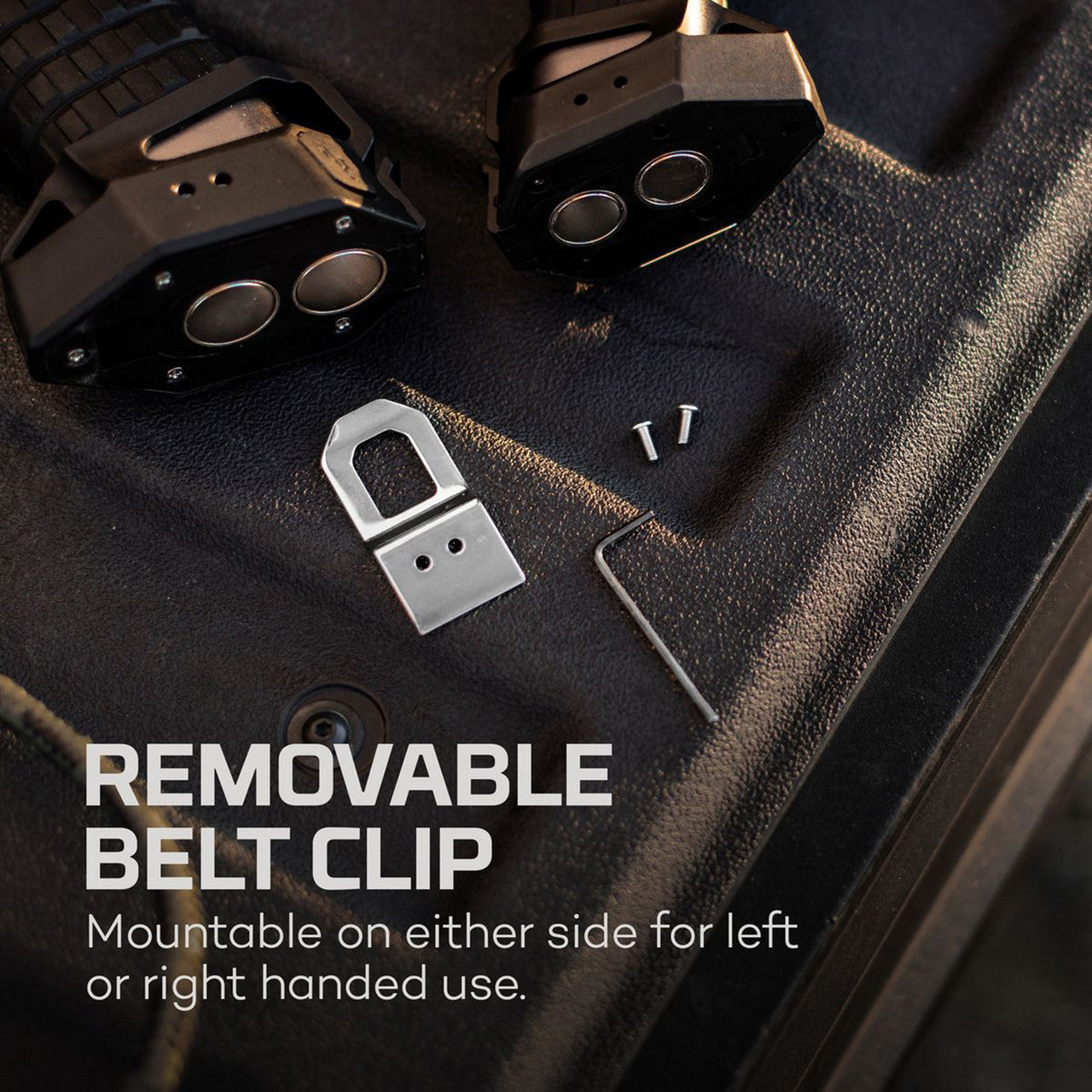 Removable belt clip for a device, mountable on either side for left or right-handed use.