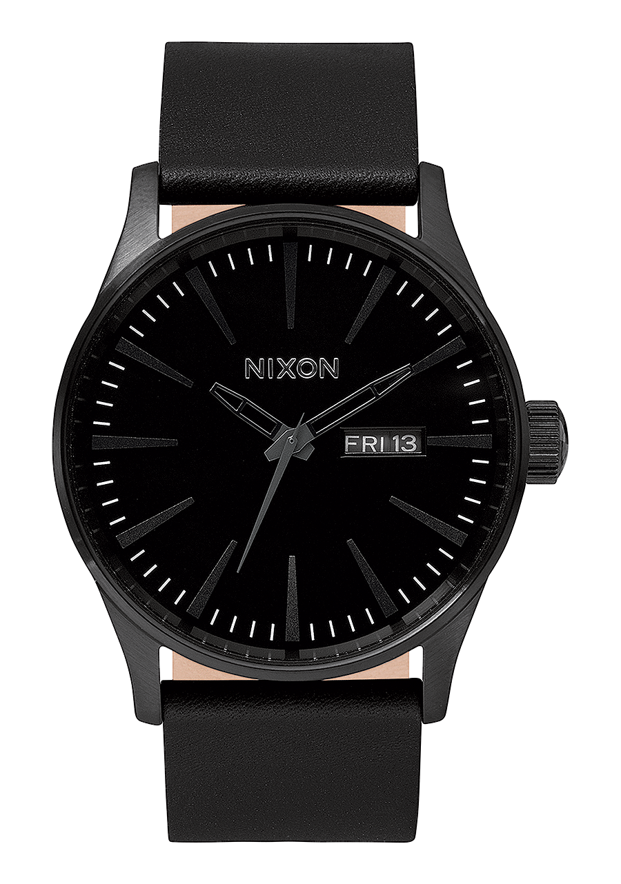 Black wristwatch with a minimalist design and leather strap.