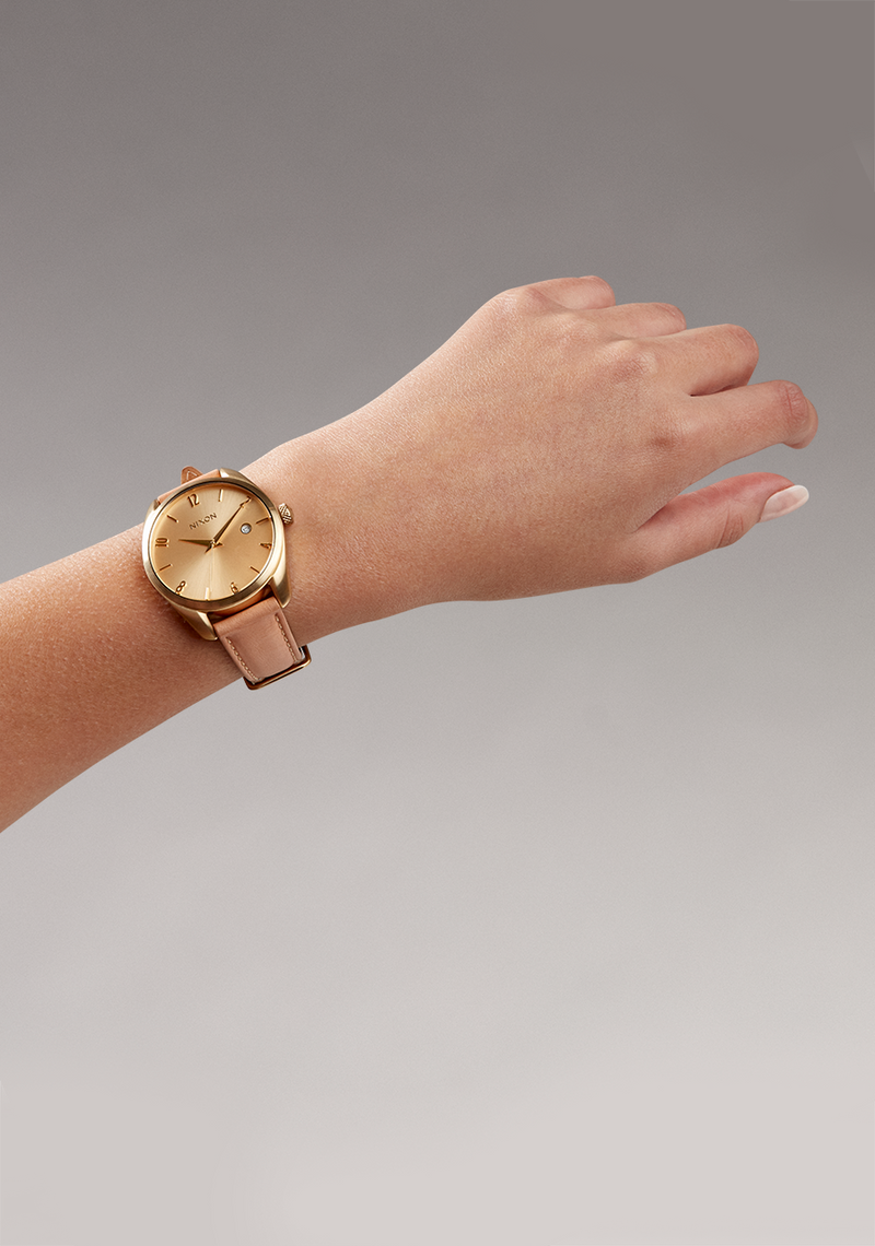 Nixon women's rose outlet gold watches