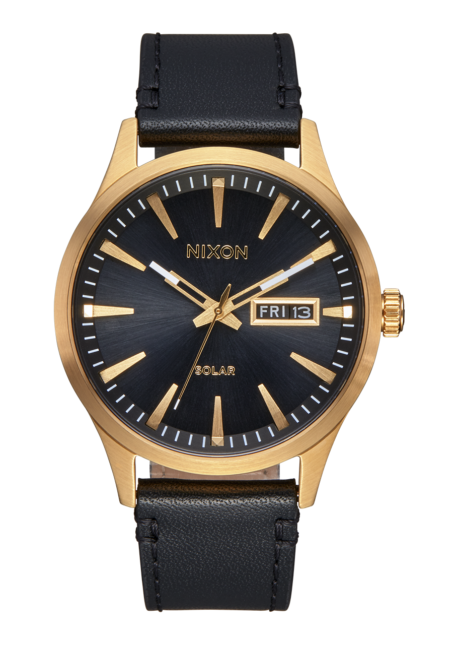 Gold-toned wristwatch with a black face and leather strap.