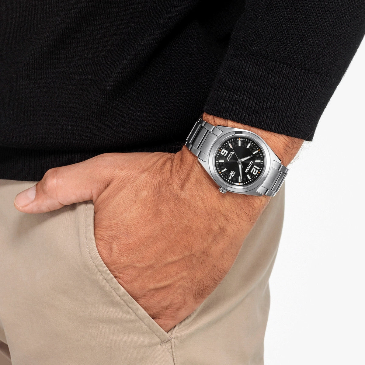 Citizen AW1641-81E Super Titanium black dial watch worn on the wrist, lifestyle view