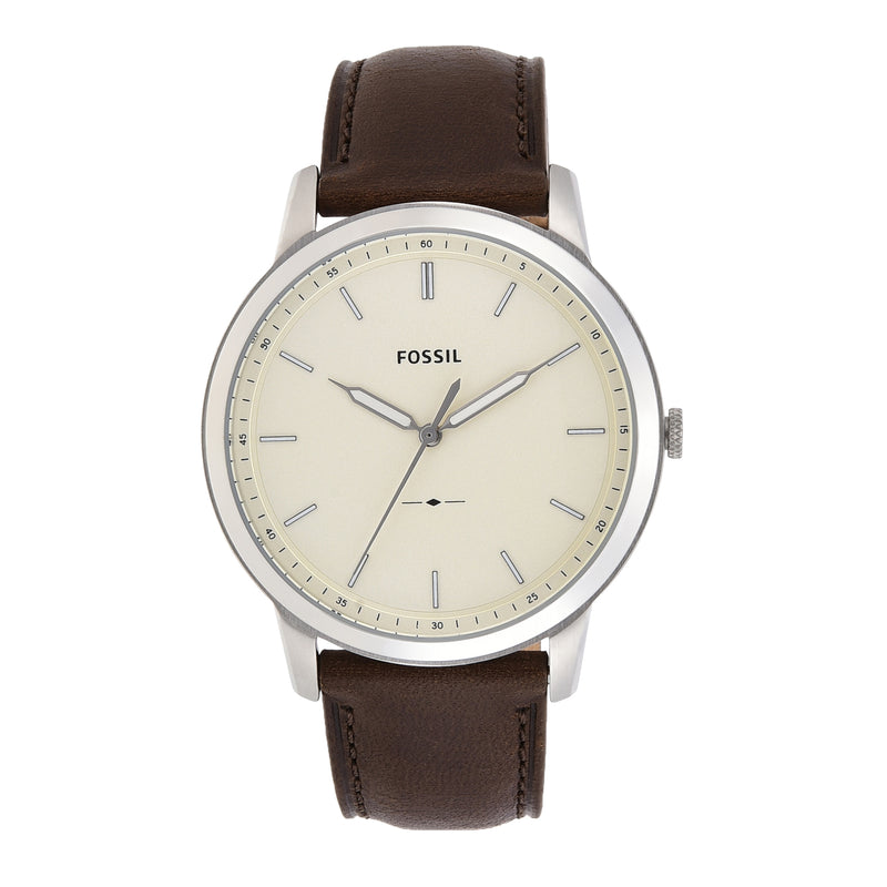 Fossil wristwatch with a brown leather strap and cream-colored dial.