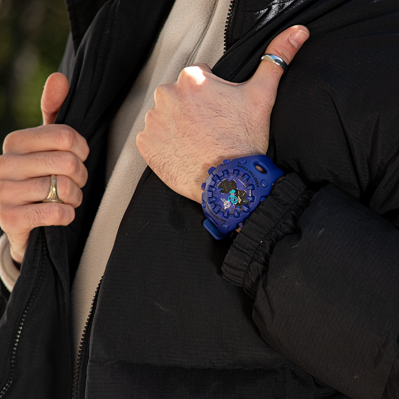 Man wearing the G-Shock Ultimate Toughness Purple Watch GAV01-2A from G-SHOCK with rugged streetwear style.