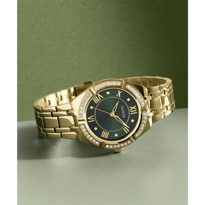 GUESS Green Cosmo Crystal Watch GW0033L8 with a gold bracelet, crystal accents, and an elegant green dial for a chic look.