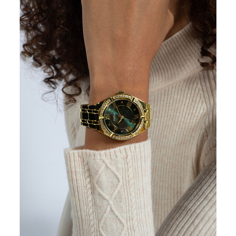 GUESS Green Cosmo Crystal Watch GW0033L8 with gold bracelet, crystal embellishments, and green dial for a chic, timeless look.