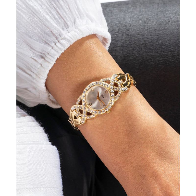 Guess Adorn Gold-Tone Analog Watch GW0682L2 with crystal bezel, silver dial, and gold-tone g-link bracelet by GUESS Watches.