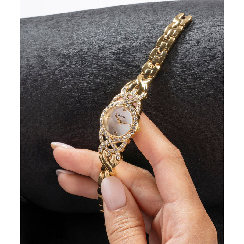 Guess Adorn Gold-Tone Analog Watch GW0682L2 with crystal-accented bezel, silver dial, and elegant gold-tone g-link bracelet.