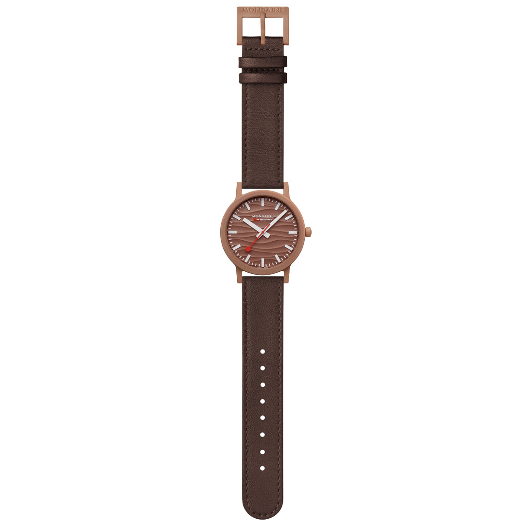 Mondaine Limited Edition Essence Mocha 41mm watch with textured wave dial on brown leather strap and rose-gold case.