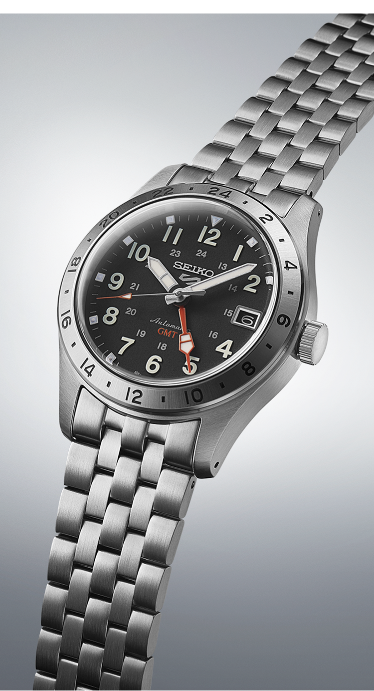 Stainless steel wristwatch with a black dial and metal link bracelet.