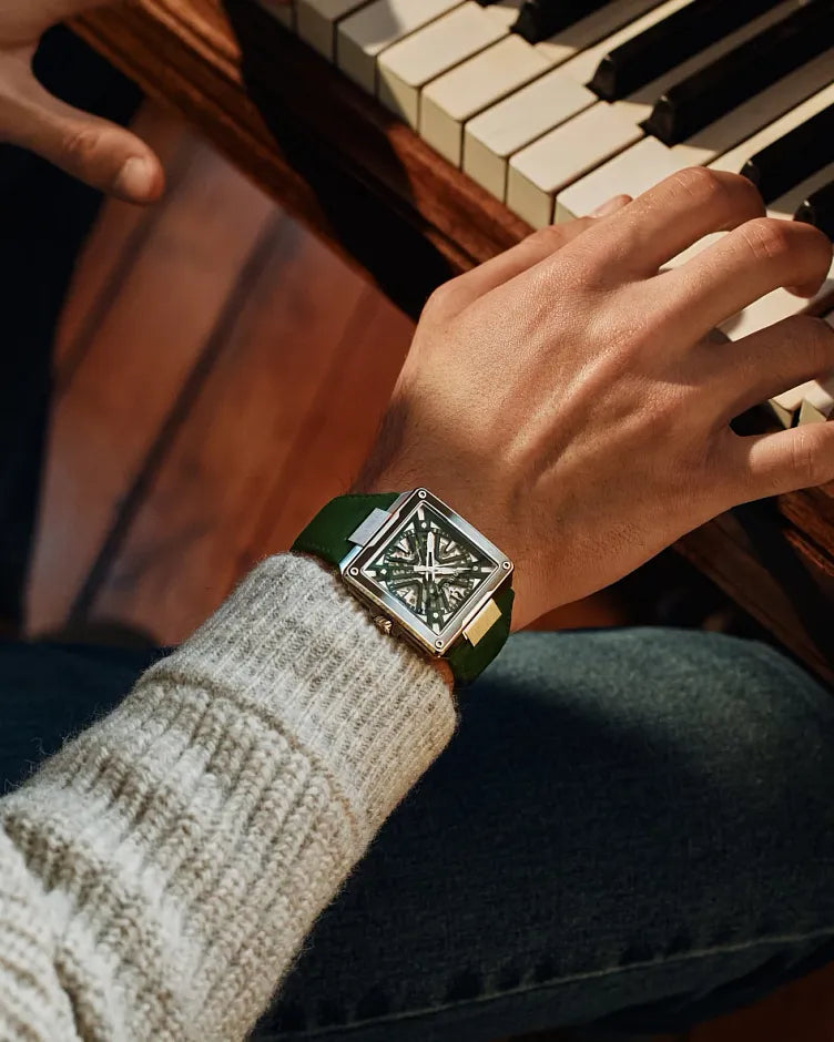 Bulova Series X 98A343 automatic men's watch with hunter green skeleton dial, green bezel insert and green suede strap — strap detail