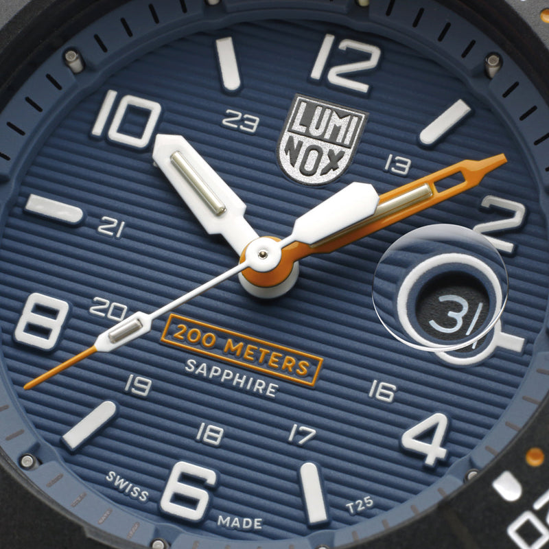 Close-up view of a blue-faced Luminox wristwatch dial showing 10:10.