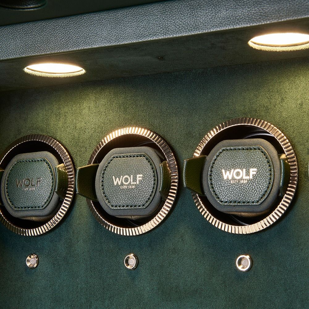 WOLF Athos 4 Piece Watch Winder Safe in Green, close-up of the lit watch winder modules