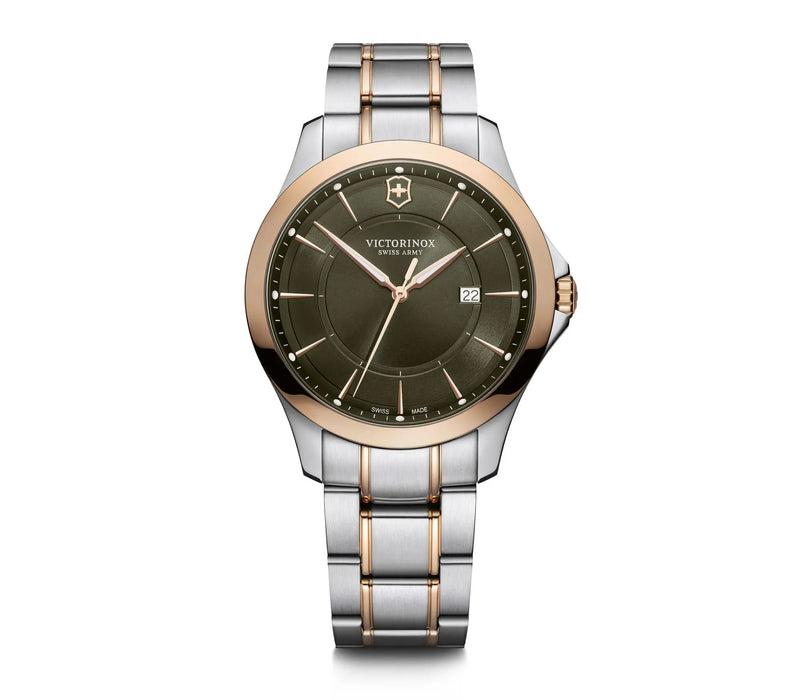 Two-tone wristwatch with a dark green dial and metal bracelet.